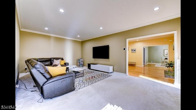 living room featuring ornamental molding, recessed lighting, and carpet floors