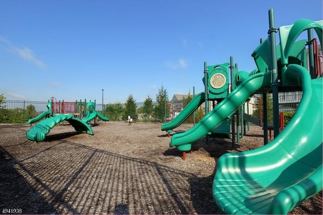 community jungle gym with fence