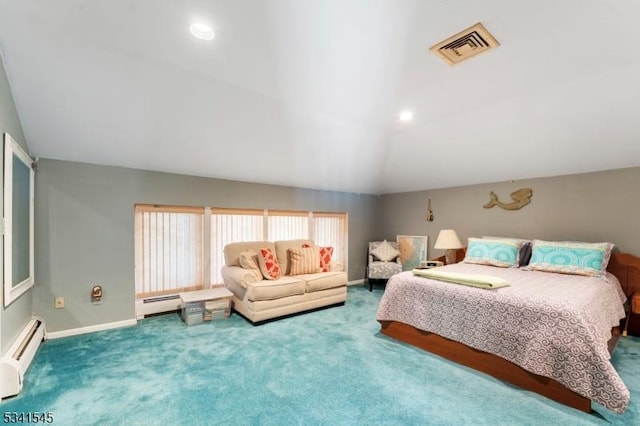 carpeted bedroom featuring vaulted ceiling, baseboard heating, visible vents, and baseboards