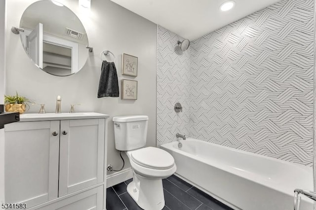 bathroom featuring visible vents, bathing tub / shower combination, toilet, tile patterned flooring, and vanity