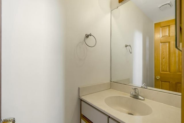 bathroom featuring vanity and visible vents