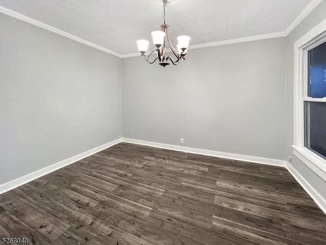 spare room featuring baseboards, dark wood-type flooring, and crown molding