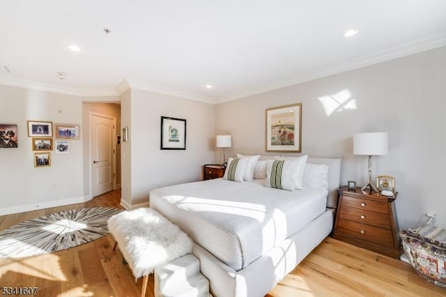 bedroom featuring light wood-type flooring, baseboards, ornamental molding, and recessed lighting