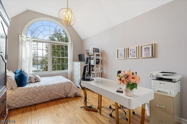 bedroom featuring wood-type flooring, a notable chandelier, and vaulted ceiling