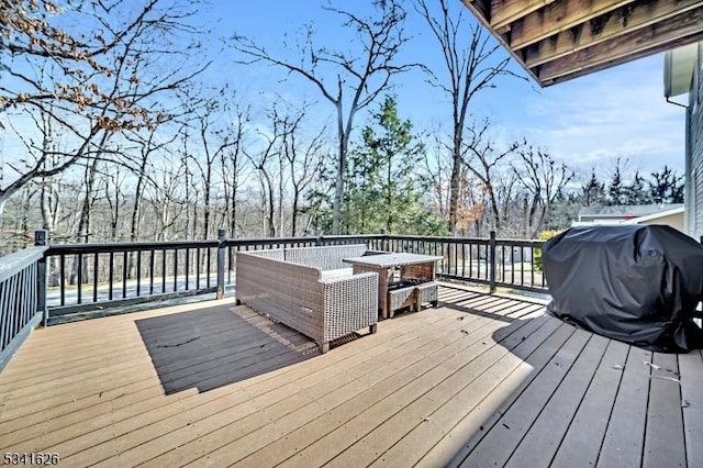 wooden deck with grilling area