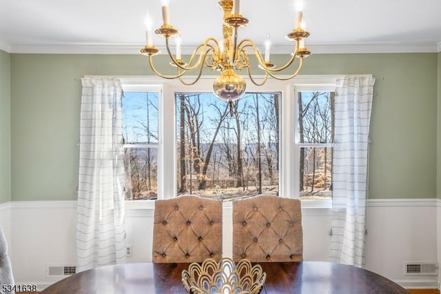 unfurnished dining area featuring a notable chandelier, visible vents, and a healthy amount of sunlight