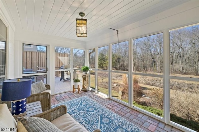 sunroom with wood ceiling