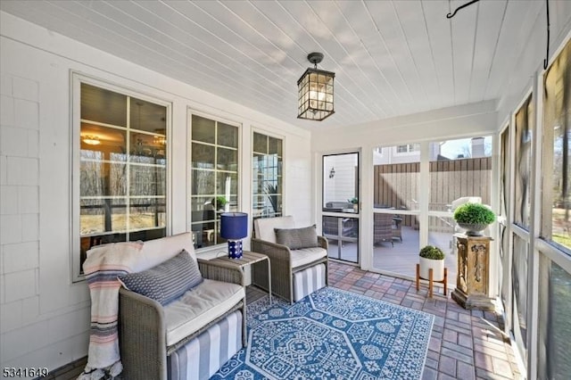 sunroom with wood ceiling