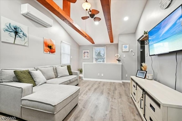 living area featuring vaulted ceiling with beams, a wall unit AC, a ceiling fan, baseboards, and light wood finished floors