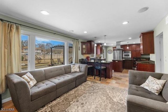 living area with recessed lighting