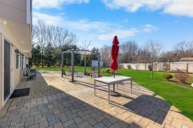 view of patio / terrace with fence and a pergola