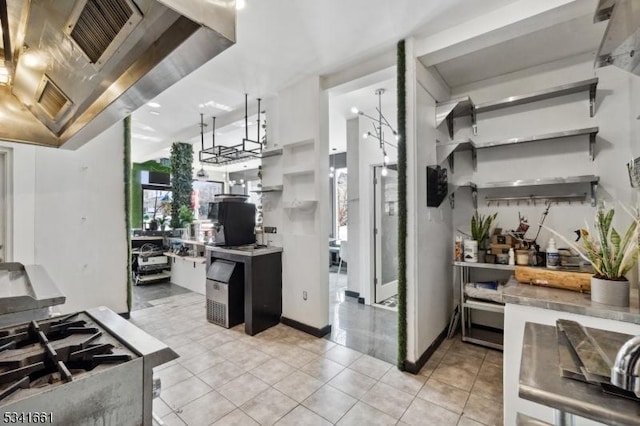 kitchen with open shelves and light tile patterned flooring