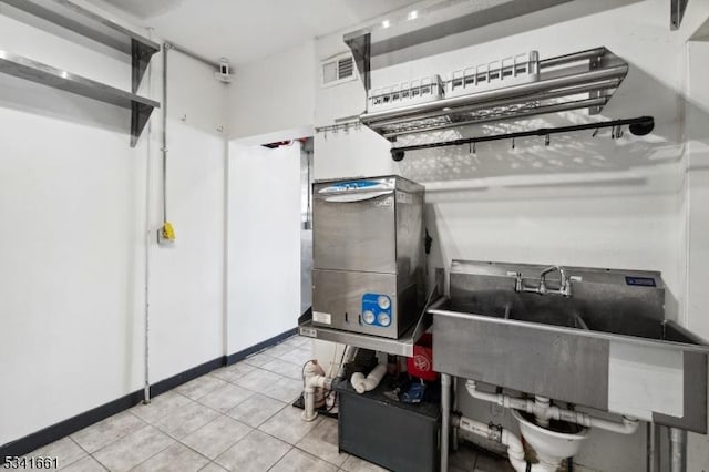 interior space featuring visible vents and a sink