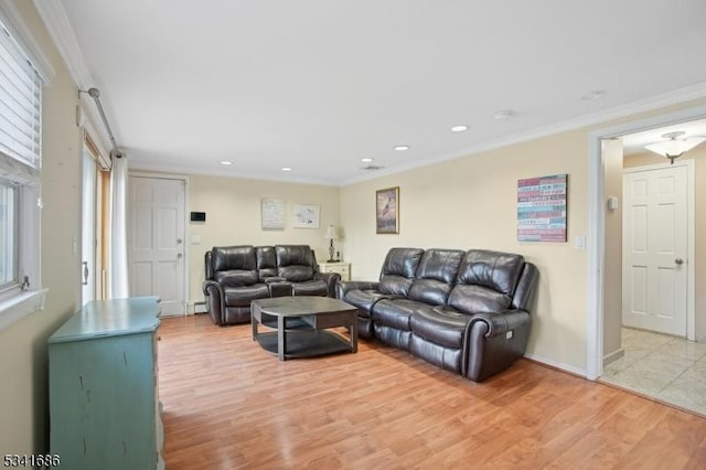 living area featuring light wood finished floors, baseboards, baseboard heating, crown molding, and recessed lighting