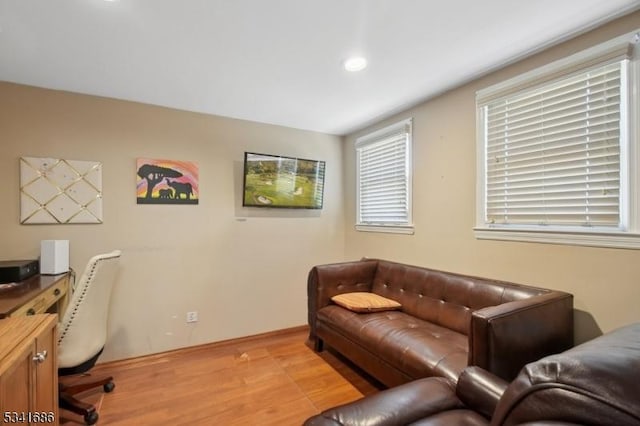 office area with light wood-style floors