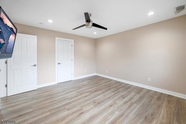 unfurnished bedroom with recessed lighting, visible vents, light wood-style flooring, and baseboards