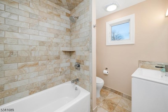 full bath with toilet, bathtub / shower combination, baseboards, and vanity