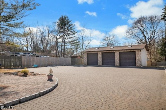 garage featuring fence