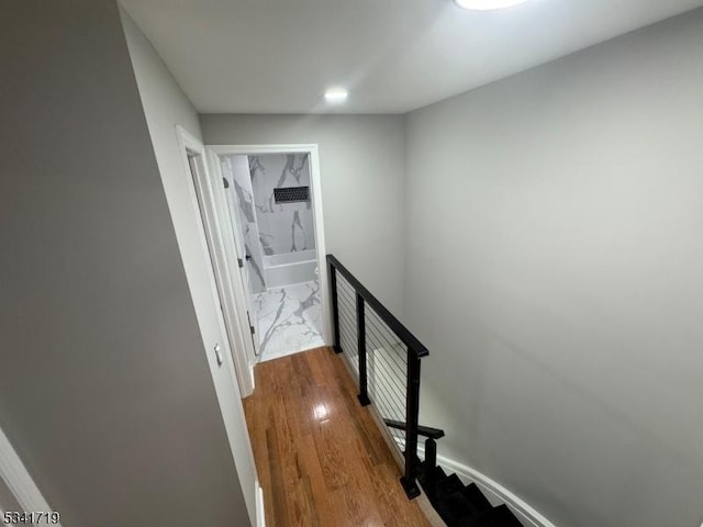 299 Halladay St, Jersey City, NJ 07304 - hallway featuring an upstairs landing, wood finished floors, and baseboards