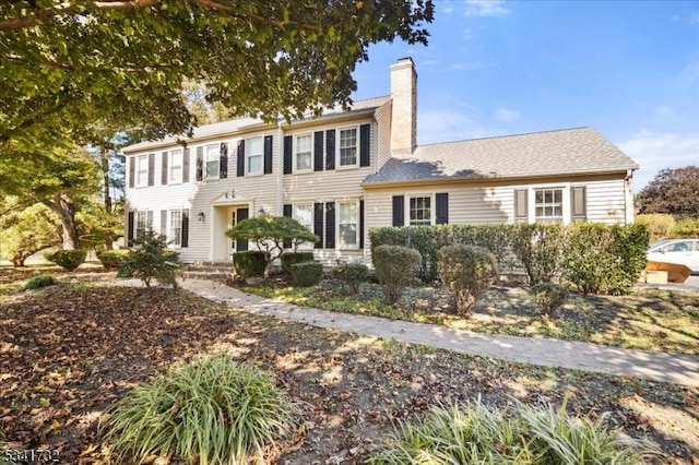 colonial home with a chimney