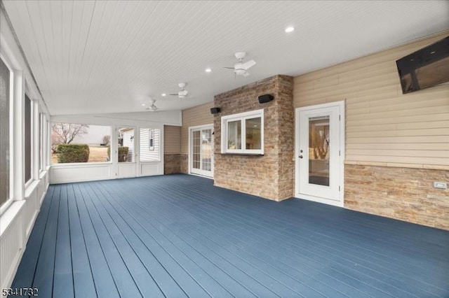 wooden deck with ceiling fan