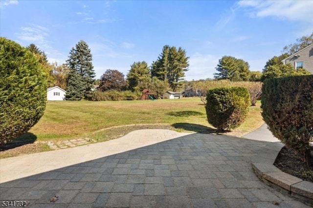 view of patio featuring a playground