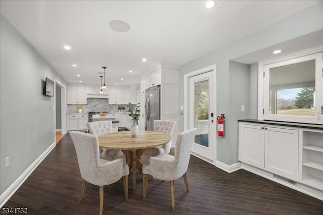 dining room featuring recessed lighting, visible vents, dark wood finished floors, and baseboards