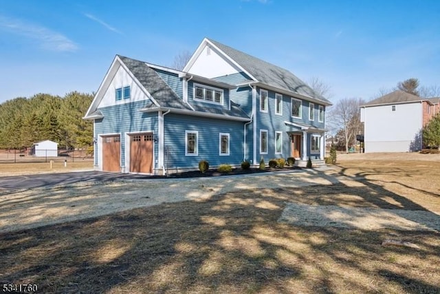 view of front of house with a garage and driveway