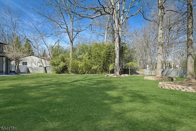 view of yard featuring fence