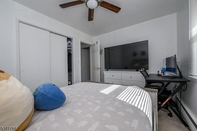 bedroom featuring carpet, a ceiling fan, and a closet