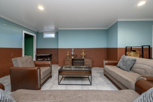 living area with ornamental molding, recessed lighting, wainscoting, and tile patterned floors