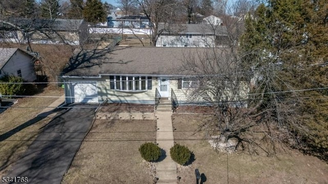 view of front of house featuring roof with shingles