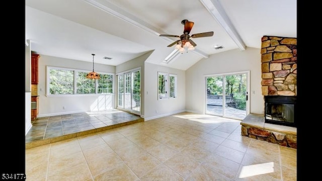 unfurnished living room featuring lofted ceiling with beams, light tile patterned floors, baseboards, and ceiling fan