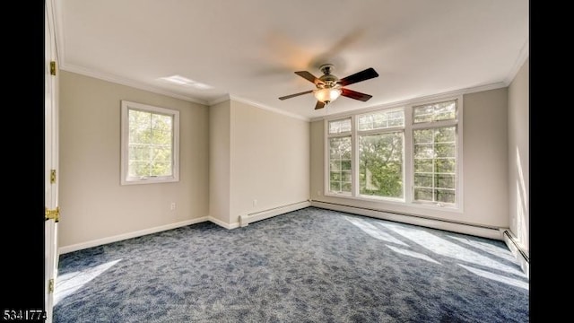 unfurnished room featuring a ceiling fan, baseboards, carpet, and crown molding