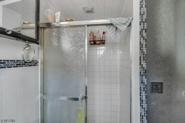 bathroom with a stall shower