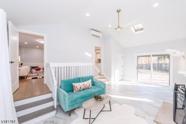 sitting room with recessed lighting, lofted ceiling with skylight, an AC wall unit, wood finished floors, and stairs