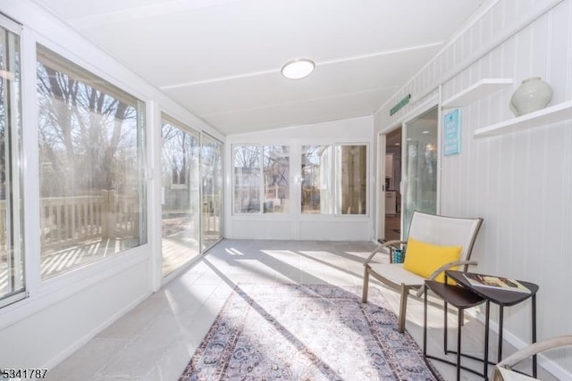 sunroom featuring a healthy amount of sunlight