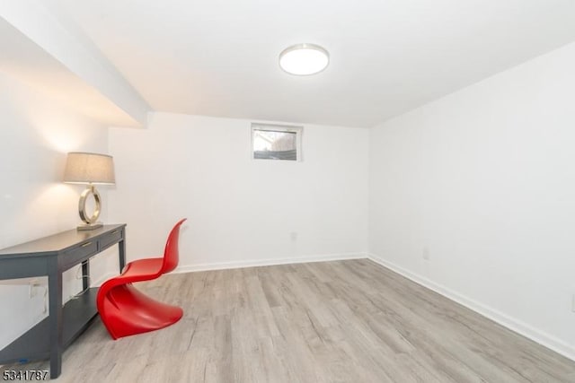 office area featuring wood finished floors and baseboards