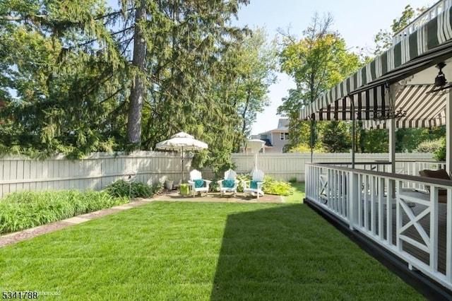 view of yard with a patio area and a fenced backyard