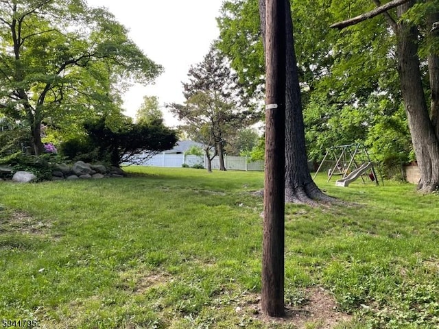 view of yard with a playground