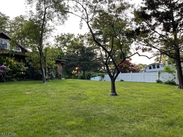 view of yard featuring fence