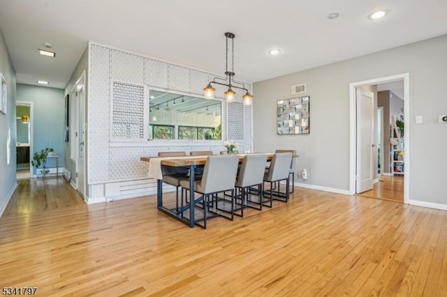 dining area with light wood-style flooring, visible vents, baseboards, and recessed lighting