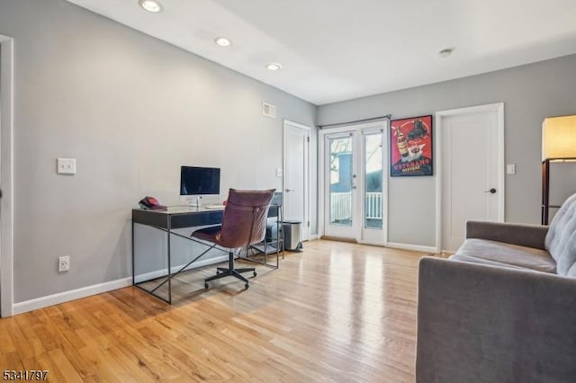 home office featuring recessed lighting, visible vents, baseboards, french doors, and light wood finished floors