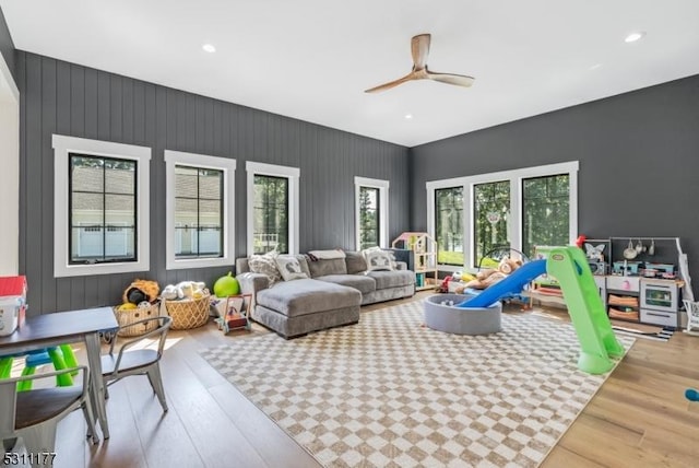 game room with recessed lighting, ceiling fan, and wood finished floors