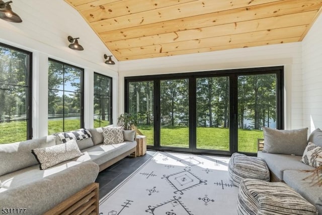 sunroom / solarium featuring lofted ceiling and wooden ceiling