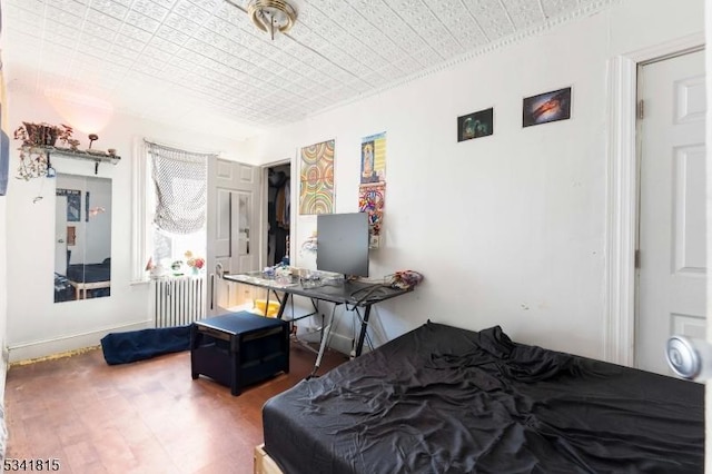 bedroom featuring wood finished floors