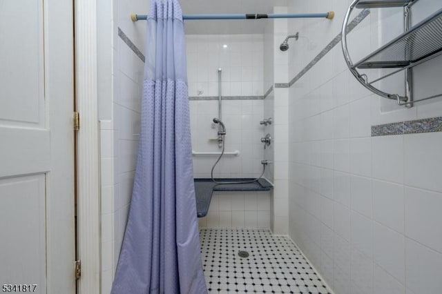 bathroom with a stall shower