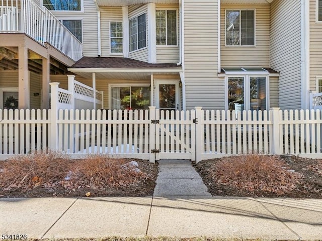 view of home's exterior with a fenced front yard