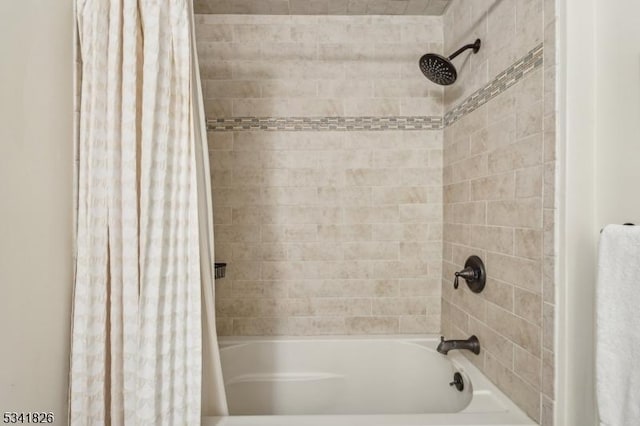 full bathroom with shower / bath combo