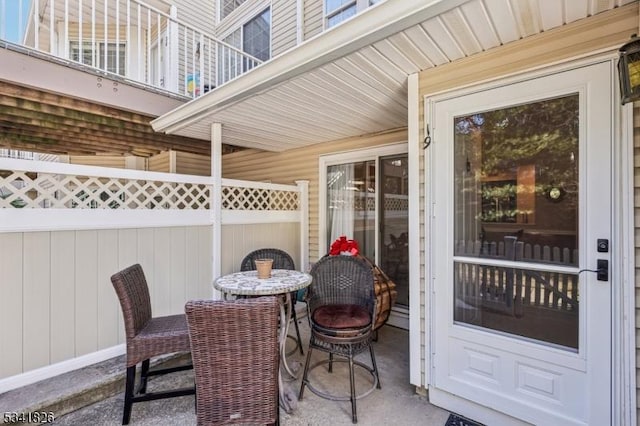 view of patio featuring fence